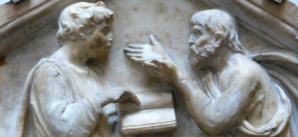 Sculpture of two men arguing