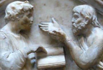 Sculpture of two men arguing