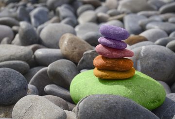 multicoloured beach stones - stacked