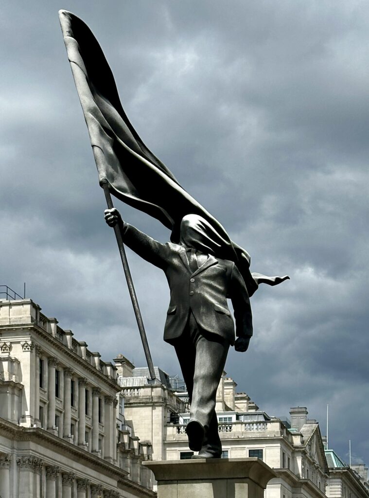 Banksy_statue_in_London