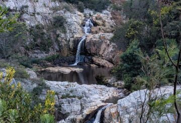 pool between two waterfalls